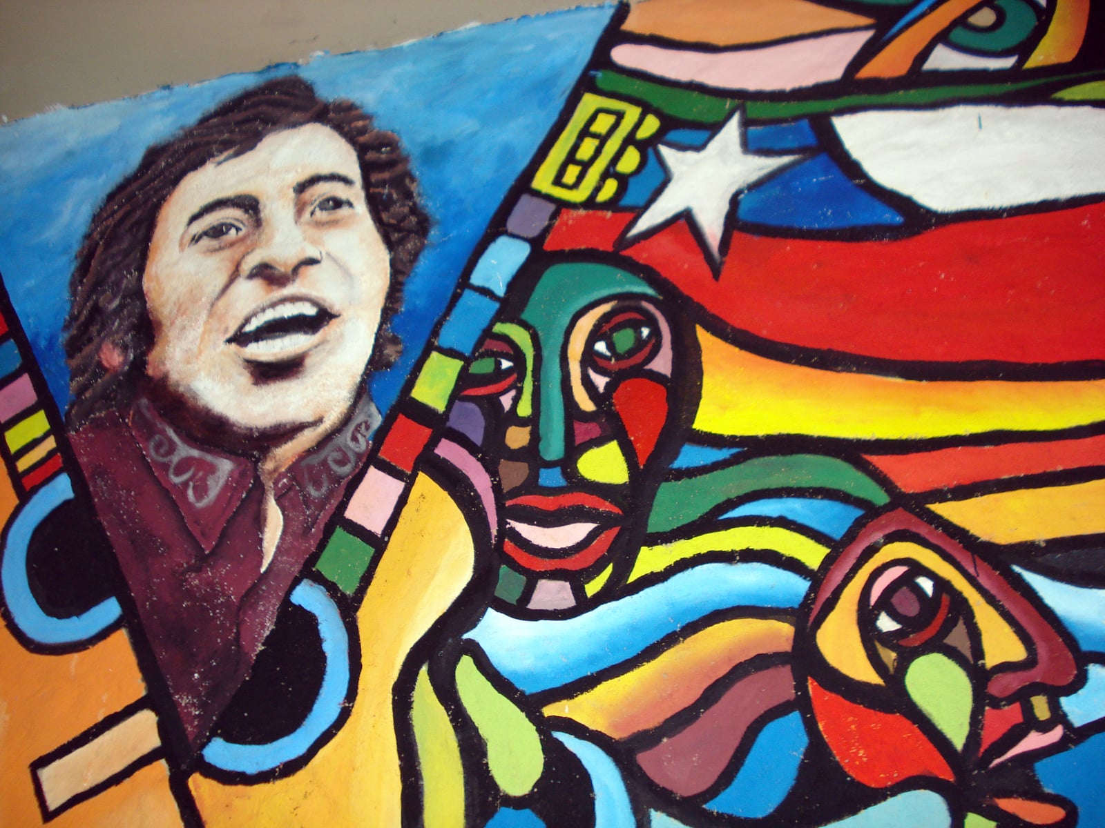 Mural a Víctor Jara, pintado en el galpón que lleva su nombre. Barrio Brasil, Santiago, Chile.