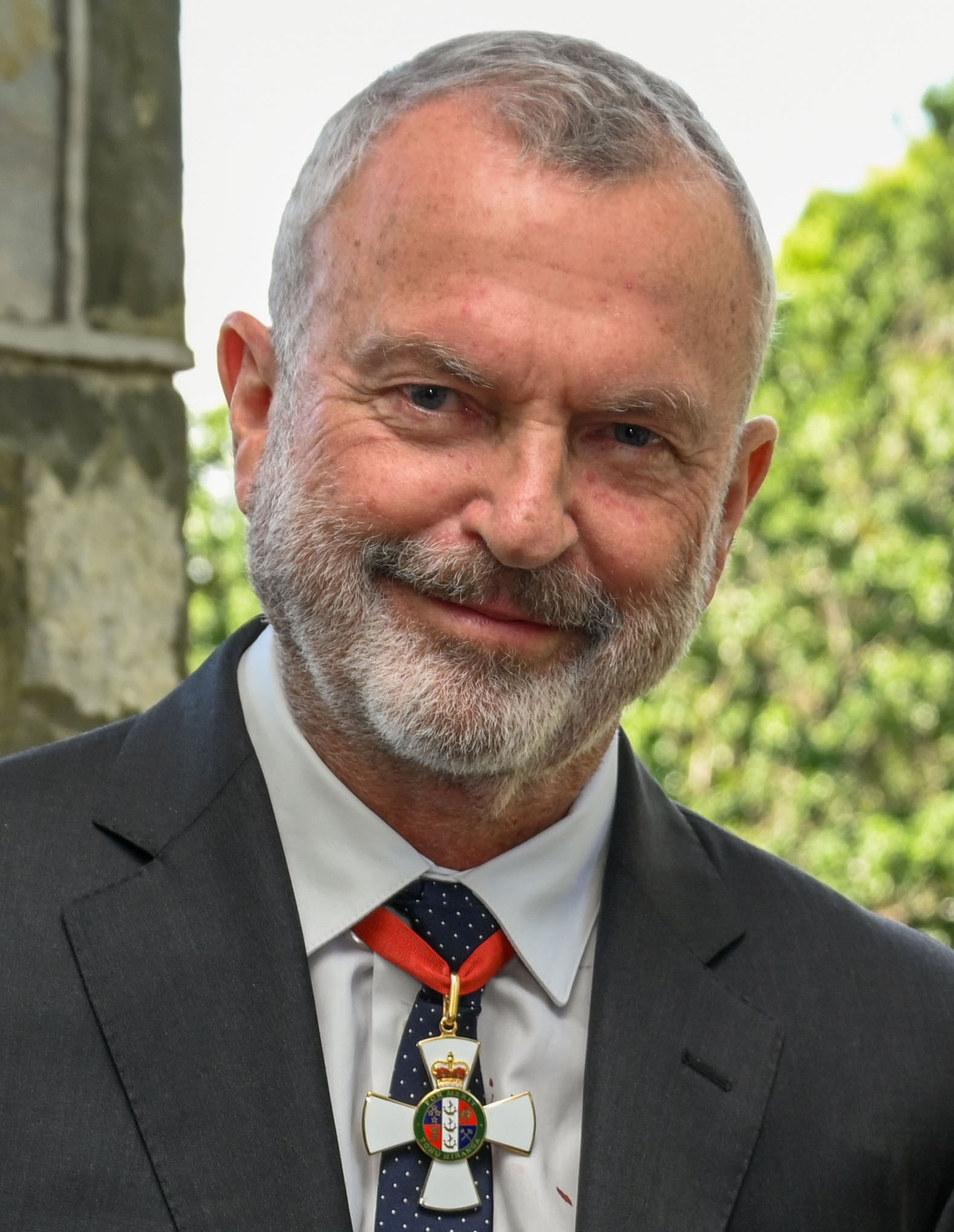 Sir Sam Neill, with Governor General of NZ, Dame Cindy Kiro, at Government House in Wellington, NZ on 11th October, 2022 after his investiture as a knight in recognition of his "outstanding contributi